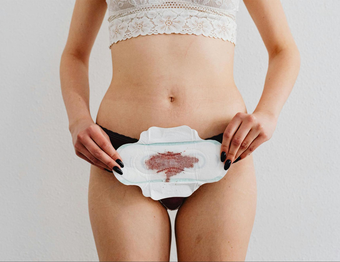 Brown Discharge During Your Cycle: Causes & When to Worry
